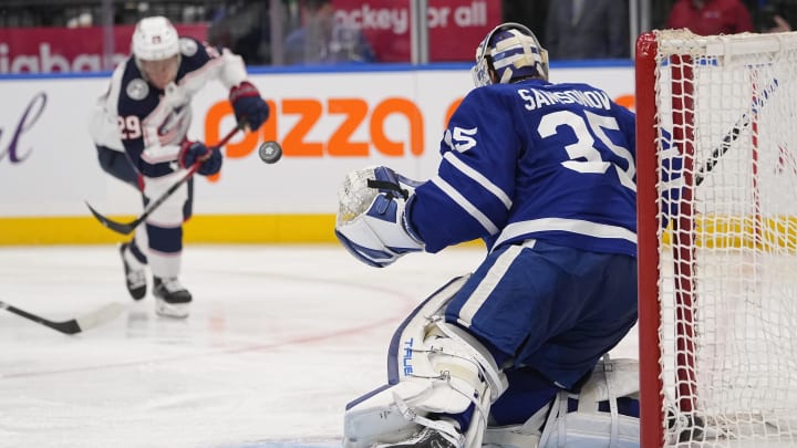 Dec 14, 2023; Toronto, Ontario, CAN; Toronto Maple Leafs goaltender Ilya Samsonov (35) watches a puck shot by Columbus Blue Jackets forward Patrik Laine (29) during the second period at Scotiabank Arena. Mandatory Credit: John E. Sokolowski-USA TODAY Sports