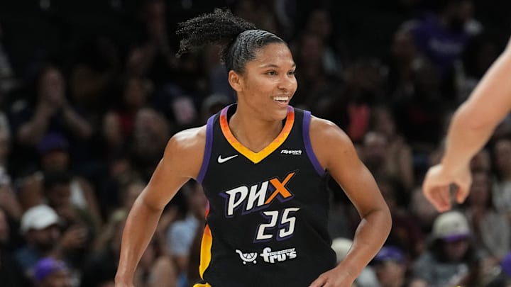 Phoenix Mercury forward Alyssa Thomas (25) smiles after making a shot against the Los Angeles Sparks at PHX Arena in Phoenix, on Sept. 9, 2025. Phoenix Mercury forward Alyssa Thomas (25) smiles after making a shot against the Los Angeles Sparks at PHX Arena in Phoenix, on Sept. 9, 2025.