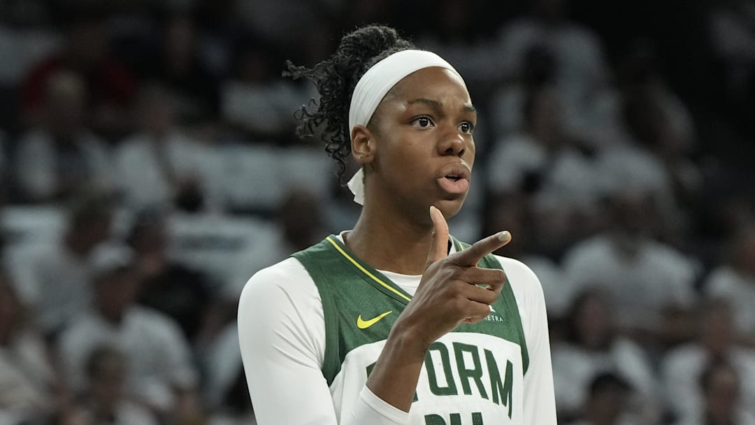 Sep 14, 2025; Las Vegas, Nevada, USA; Seattle Storm center Dominique Malonga (14) gestures to a teammate before foul shot by the Las Vegas Aces in the second quarter during game one of round one for the 2025 WNBA Playoffs at Michelob Ultra Arena. Mandatory Credit: Candice Ward-Imagn Images