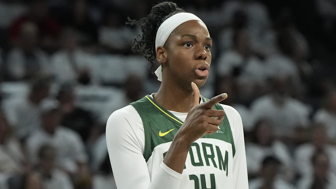 Sep 14, 2025; Las Vegas, Nevada, USA; Seattle Storm center Dominique Malonga (14) gestures to a teammate before foul shot by the Las Vegas Aces in the second quarter during game one of round one for the 2025 WNBA Playoffs at Michelob Ultra Arena. Mandatory Credit: Candice Ward-Imagn Images Sep 14, 2025; Las Vegas, Nevada, USA; Seattle Storm center Dominique Malonga (14) gestures to a teammate before foul shot by the Las Vegas Aces in the second quarter during game one of round one for the 2025 WNBA Playoffs at Michelob Ultra Arena. Mandatory Credit: Candice Ward-Imagn Images