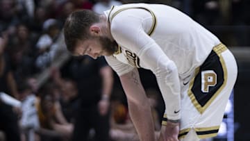 Purdue Boilermakers guard Braden Smith (3) holds his knee 