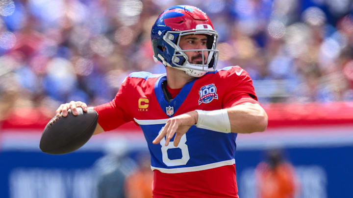 Sep 8, 2024; East Rutherford, New Jersey, USA; New York Giants quarterback Daniel Jones (8) throws a pass against the Minnesota Vikings during the first half at MetLife Stadium. Mandatory Credit: John Jones-Imagn Images