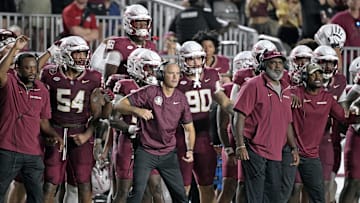 Sep 21, 2024; Tallahassee, Florida, USA; Florida State Seminoles head coach Mike Norvell and his team watch the time tick off of the clock during the fourth quarter against the California Golden Bears at Doak S. Campbell Stadium. Mandatory Credit: Melina Myers-Imagn Images