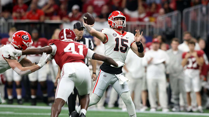 Dec 2, 2023; Atlanta, GA, USA; Georgia Bulldogs quarterback Carson Beck (15) throws a pass in the second quarter against the Alabama Crimson Tide at Mercedes-Benz Stadium. Mandatory Credit: Brett Davis-Imagn Images