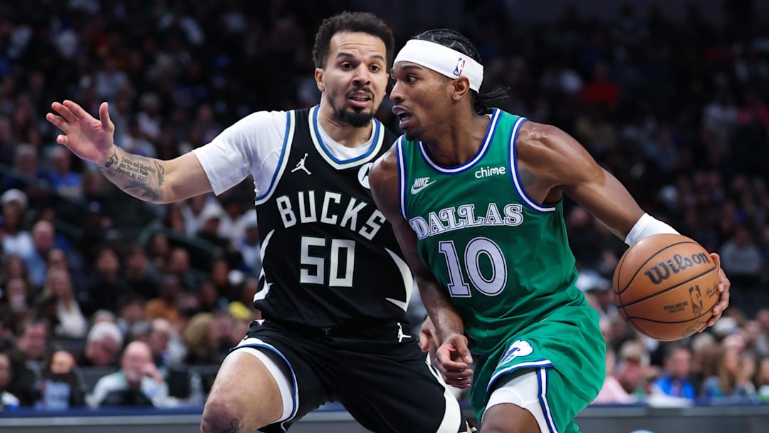 Nov 10, 2025; Dallas, Texas, USA;  Dallas Mavericks guard Brandon Williams (10) drives to the basket as Milwaukee Bucks guard Cole Anthony (50) defends during the third quarter at American Airlines Center. Mandatory Credit: Kevin Jairaj-Imagn Images