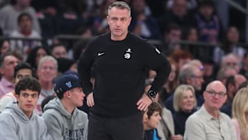 Nov 30, 2025; New York, New York, USA;  Toronto Raptors head coach Darko Rajakovic watches from the bench in the first quarter against the New York Knicks at Madison Square Garden. Mandatory Credit: Wendell Cruz-Imagn Images