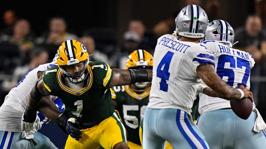 Green Bay Packers defensive end Micah Parsons (1) rushes against Dallas Cowboys quarterback Dak Prescott.