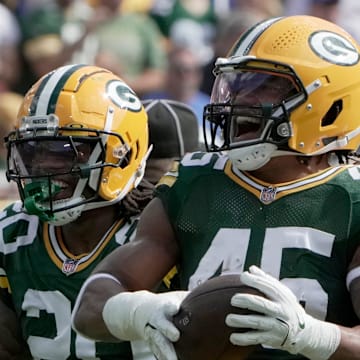 Green Bay Packers linebacker Eric Wilson (45) celebrates his interception during the third quarter against the Colts on Sunday.