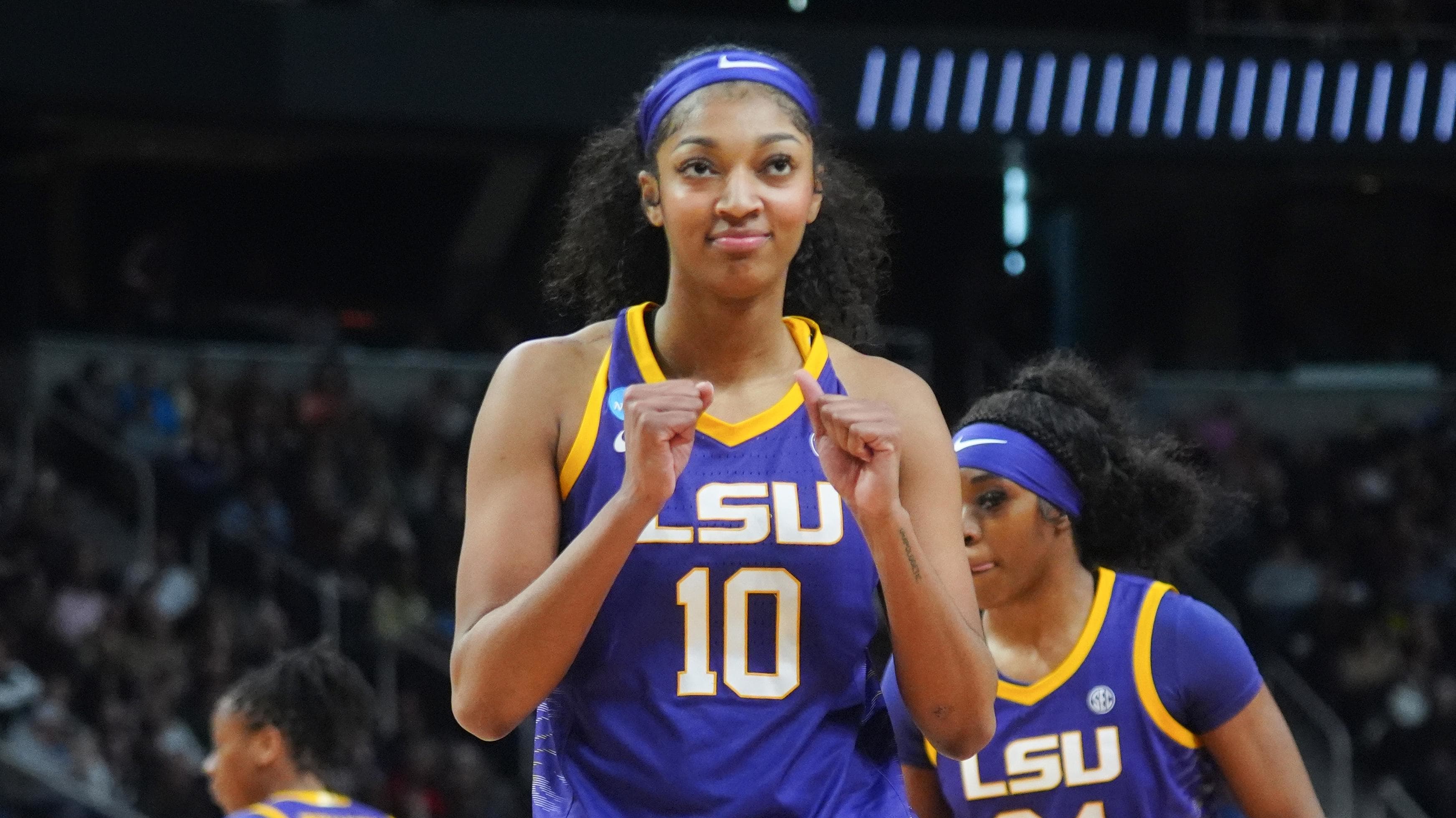 LSU Tigers forward Angel Reese reacts after a foul call.