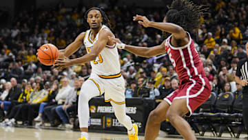 Missouri Tigers guard Aidan Shaw (23) drives to the basket, in a game against the Oklahoma Sooners this season.