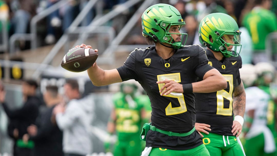 Oregon quarterback Dante Moore throws out a pass during warmups ahead of the Oregon Ducks’ Spring Game Saturday, April 27. 2024 at Autzen Stadium in Eugene, Ore.