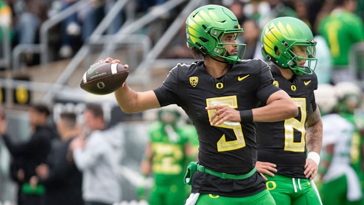 Oregon quarterback Dante Moore throws out a pass during warmups ahead of the Oregon Ducks’ Spring Game Saturday, April 27. 2024 at Autzen Stadium in Eugene, Ore.
