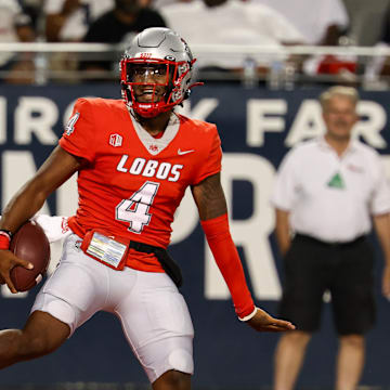 New Mexico quarterback Devon Dampier had a five-touchdown game against the Arizona Wildcats. 