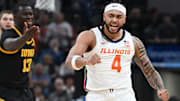 Mar 13, 2025; Indianapolis, IN, USA; Illinois Fighting Illini guard Kylan Boswell (4) celebrates after a play during the first half against the Iowa Hawkeyes at Gainbridge Fieldhouse. Mandatory Credit: Robert Goddin-Imagn Images