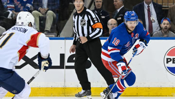 May 30, 2024; New York, New York, USA; New York Rangers left wing Artemi Panarin (10) skates with the puck as Florida Panthers defenseman Oliver Ekman-Larsson (91) defends during the first period in game five of the Eastern Conference Final of the 2024 Stanley Cup Playoffs at Madison Square Garden. Mandatory Credit: Dennis Schneidler-USA TODAY Sports