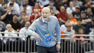 Penn State wrestling coach Cael Sanderson gives instructions during a Nittany Lions match. 