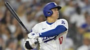 Sep 6, 2024; Los Angeles, California, USA;  Los Angeles Dodgers designated hitter Shohei Ohtani (17) singles in the eighth inning against the Cleveland Guardians at Dodger Stadium. Mandatory Credit: Jayne Kamin-Oncea-Imagn Images