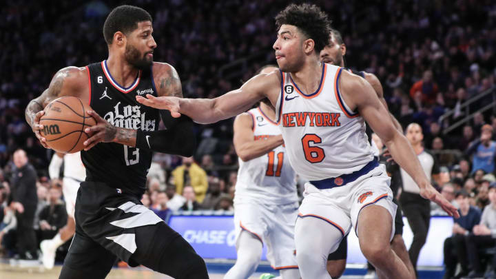 Feb 4, 2023; New York, New York, USA;  LA Clippers guard Paul George (13) looks to drive past New York Knicks guard Quentin Grimes (6) in overtime at Madison Square Garden. Mandatory Credit: Wendell Cruz-USA TODAY Sports