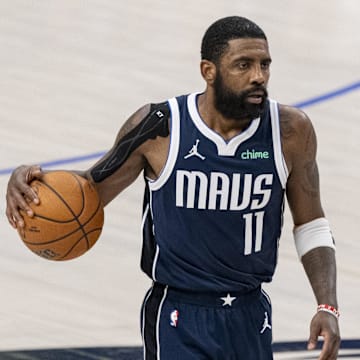 Jun 14, 2024; Dallas, Texas, USA; Dallas Mavericks guard Kyrie Irving (11) in action during the game between the Dallas Mavericks and the Boston Celtics in game four of the 2024 NBA Finals at American Airlines Center. Mandatory Credit: Jerome Miron-Imagn Images