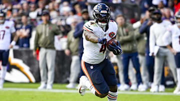 Oct 26, 2025; Baltimore, Maryland, USA;  Chicago Bears running back D'Andre Swift (4) rushes during the game against the Baltimore Ravens at M&T Bank Stadium. Mandatory Credit: Tommy Gilligan-Imagn Images