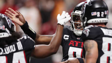 Sep 7, 2025; Atlanta, Georgia, USA; Atlanta Falcons quarterback Michael Penix Jr. (9) celebrates with wide receiver Ray-Ray McCloud III (34) after a play against the Tampa Bay Buccaneers during the fourth quarter at Mercedes-Benz Stadium. Mandatory Credit: Brett Davis-Imagn Images
