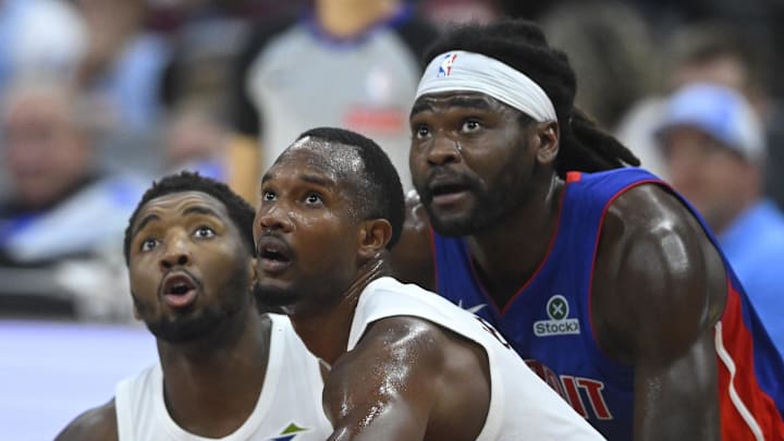 Donovan Mitchell (left) and Evan Mobley (center) sat out the Cavaliers' win over the Heat Wednesday.