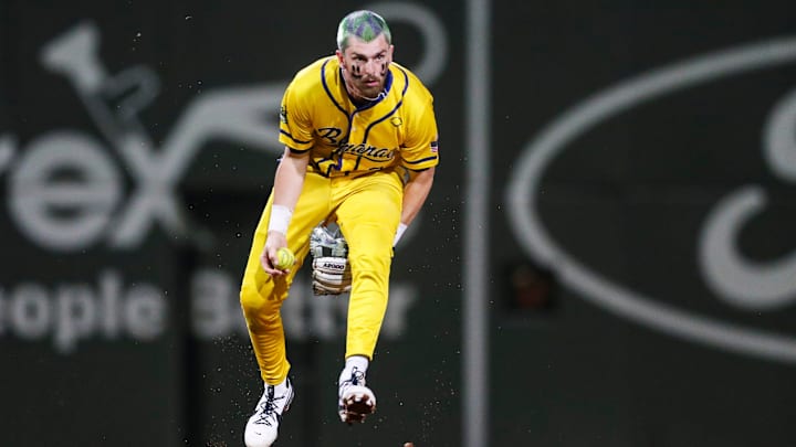 Bananas infielder Ryan Cox (6) tosses the ball between his legs before throwing to first during a banana ball game between the Savannah Bananas and Party Animals at JetBlue Park in Fort Myers, Fla., on Friday, Feb. 14, 2025. Bananas infielder Ryan Cox (6) tosses the ball between his legs before throwing to first during a banana ball game between the Savannah Bananas and Party Animals at JetBlue Park in Fort Myers, Fla., on Friday, Feb. 14, 2025.