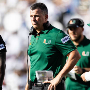 Aug 31, 2024; Gainesville, Florida, USA; Miami Hurricanes head coach Mario Cristobal looks during the second half against the Florida Gators at Ben Hill Griffin Stadium. Mandatory Credit: Matt Pendleton-USA TODAY Sports