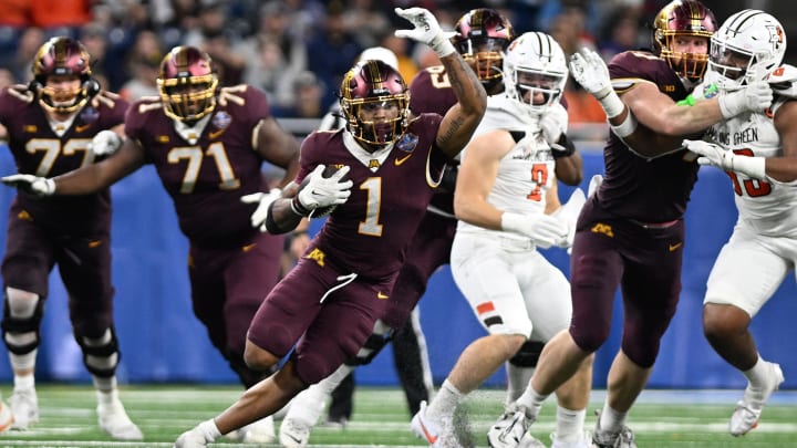 Dec 26, 2023; Detroit, MI, USA; Minnesota Golden Gophers running back Darius Taylor (1) runs the ball against the Bowling Green Falcons in the third quarter at Ford Field. Mandatory Credit: Lon Horwedel-USA TODAY Sports