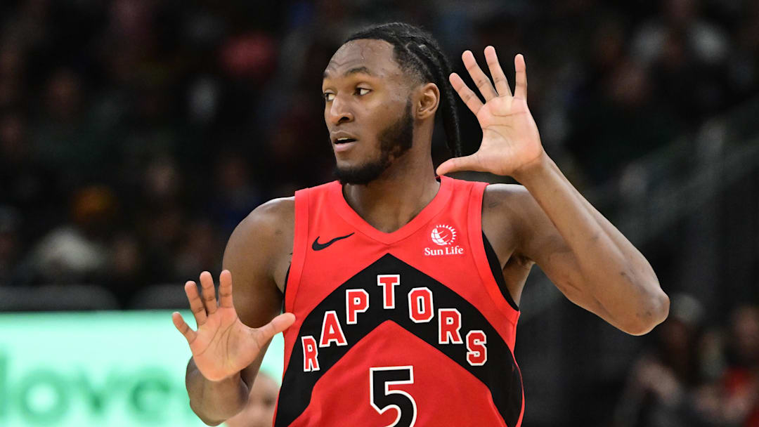 Feb 22, 2026; Milwaukee, Wisconsin, USA; Toronto Raptors guard Immanuel Quickley (5) reacts after scoring a 3-point basket against the Milwaukee Bucks in the third quarter at Fiserv Forum. Mandatory Credit: Benny Sieu-Imagn Images