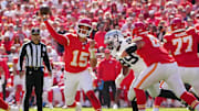 Oct 19, 2025; Kansas City, Missouri, USA; Kansas City Chiefs quarterback Patrick Mahomes (15) passes the ball against the Las Vegas Raiders during the second quarter of the game at GEHA Field at Arrowhead Stadium. Mandatory Credit: Denny Medley-Imagn Images