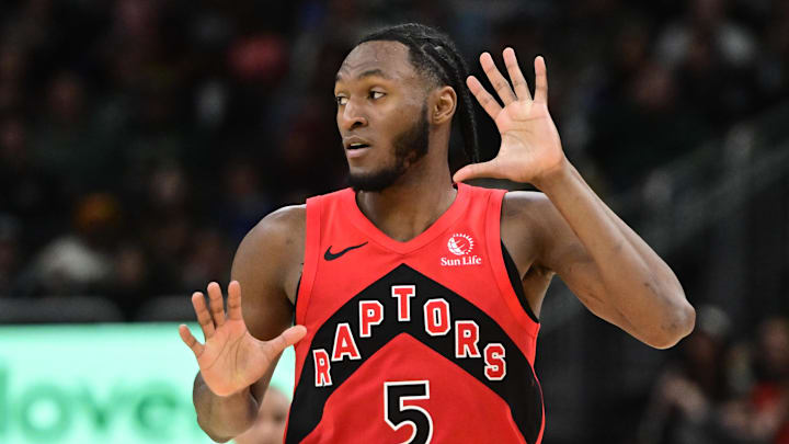 Feb 22, 2026; Milwaukee, Wisconsin, USA; Toronto Raptors guard Immanuel Quickley (5) reacts after scoring a 3-point basket against the Milwaukee Bucks in the third quarter at Fiserv Forum. Mandatory Credit: Benny Sieu-Imagn Images