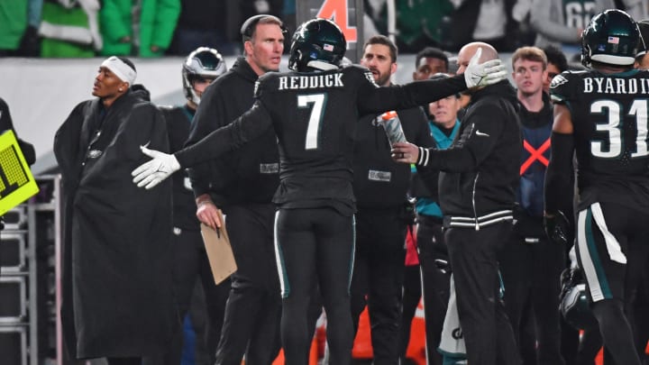 Dec 25, 2023; Philadelphia, Pennsylvania, USA; Philadelphia Eagles linebacker Haason Reddick (7) with Jeremiah Washburn, defensive ends/outside linebackers coach and head coach Nick Sirianni against the New York Giants at Lincoln Financial Field.