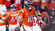 Oct 19, 2025; Denver, Colorado, USA; Denver Broncos quarterback Bo Nix (10) celebrates after play during the second half against the New York Giants at Empower Field at Mile High. 