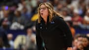 Apr 4, 2025; Tampa, FL, USA;  UCLA Bruins head coach Cori Close reacts during first quarter in a semifinal of the women's 2025 NCAA tournament against the Connecticut Huskies at Amalie Arena. Mandatory Credit: Nathan Ray Seebeck-Imagn Images