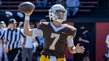 Mount Carmel quarterback Emmett Dowling looks to pass during his team's 43-42 win over Archbishop Moeller in Ohio.