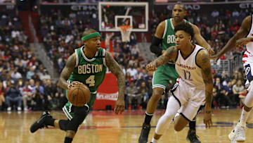 May 12, 2017; Washington, DC, USA; Boston Celtics guard Isaiah Thomas (4) dribbles the ball as Washington Wizards forward Kelly Oubre Jr. (12) defends in the first quarter in game six of the second round of the 2017 NBA Playoffs at Verizon Center. Mandatory Credit: Geoff Burke-Imagn Images