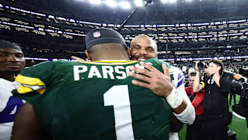 Sep 28, 2025; Arlington, TX; Green Bay Packers defensive end Micah Parsons and Dallas Cowboys quarterback Dak Prescott  embrace after their Week 4 showdown