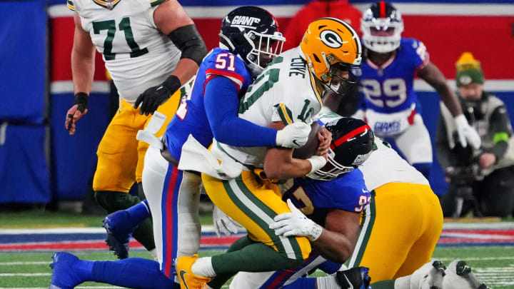 Dec 11, 2023; East Rutherford, New Jersey, USA; New York Giants linebacker Azeez Ojulari (51) sacks Green Bay Packers quarterback Jordan Love (10) during the fourth quarter at MetLife Stadium. Mandatory Credit: Robert Deutsch-USA TODAY Sports