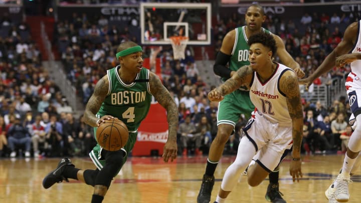 May 12, 2017; Washington, DC, USA; Boston Celtics guard Isaiah Thomas (4) dribbles the ball as Washington Wizards forward Kelly Oubre Jr. (12) defends in the first quarter in game six of the second round of the 2017 NBA Playoffs at Verizon Center. Mandatory Credit: Geoff Burke-USA TODAY Sports