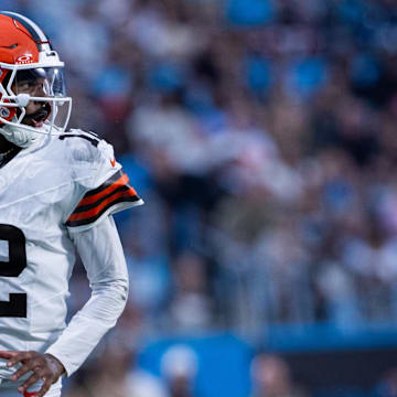 Aug 8, 2025; Charlotte, North Carolina, USA; Cleveland Browns quarterback Shedeur Sanders (12) looks down field during the second quarter against the Carolina Panthers at Bank of America Stadium. Mandatory Credit: Scott Kinser-The USAToday Network via Imagn Images 