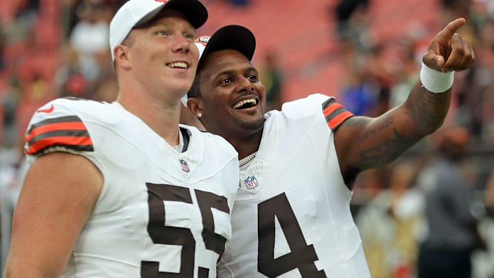 Cleveland Browns center Ethan Pocic (55) and quarterback Deshaun Watson (4) look at the crowd during the second half of an NFL preseason football game at Cleveland Browns Stadium, Saturday, Aug. 10, 2024, in Cleveland, Ohio.