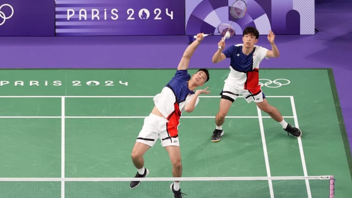 Jul 28, 2024; Paris, France; Joshua Yuan (USA) and Vinson Chiu (USA) play against Yu Chen Liu (CHN) ad Xuan Yi Ou (CHN) during the Paris 2024 Olympic Summer Games at Adidas Arena. Mandatory Credit: Katie Goodale-USA TODAY Sports