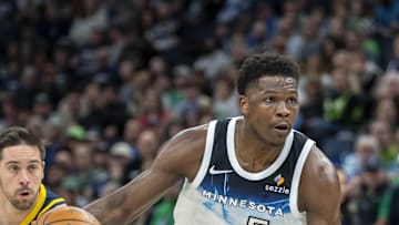 Mar 17, 2025; Minneapolis, Minnesota, USA; Minnesota Timberwolves guard Anthony Edwards (5) dribbles the ball against the Indiana Pacers in the first half at Target Center. Mandatory Credit: Jesse Johnson-Imagn Images