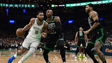 Nov 8, 2024; Boston, Massachusetts, USA;  Brooklyn Nets guard Ben Simmons (10) controls the ball while Boston Celtics center Al Horford (42) defends during the first half at TD Garden. Mandatory Credit: Bob DeChiara-Imagn Images