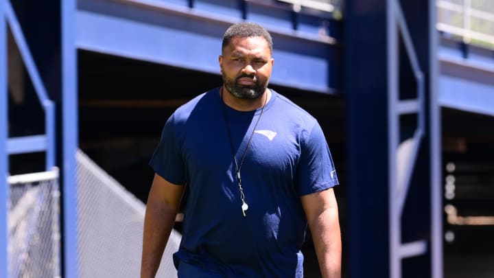 Jun 10, 2024; Foxborough, MA, USA; New England Patriots head coach Jerod Mayo walks to the microphones for a press conference at minicamp at Gillette Stadium. Mandatory Credit: Eric Canha-USA TODAY Sports