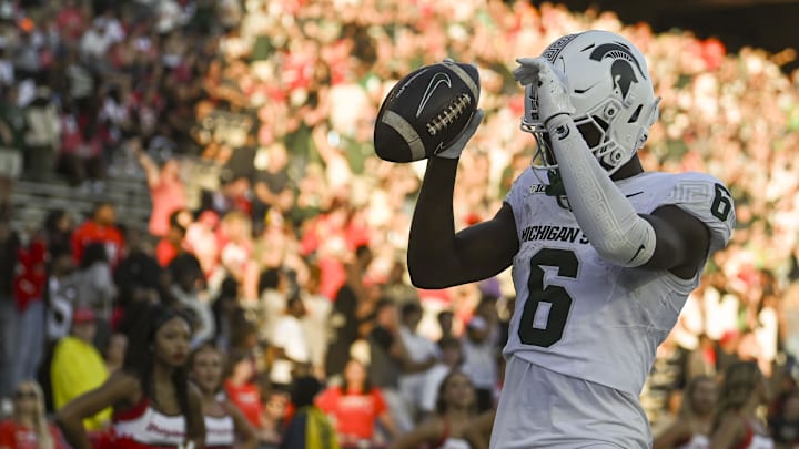 Sep 7, 2024; College Park, Maryland, USA; *Michigan State Spartans wide receiver Nick Marsh (6) celebrates after scoring a touchdown during the second half against the Maryland Terrapins  at SECU Stadium. Mandatory Credit: Tommy Gilligan-Imagn Images