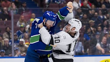 Jan 16, 2025; Vancouver, British Columbia, CAN; Vancouver Canucks defenseman Vincent Desharnais (73) fights with Los Angeles Kings forward Tanner Jeannot (10) in the first period at Rogers Arena. Mandatory Credit: Bob Frid-Imagn Images