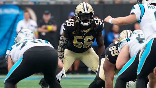 New Orleans Saints linebacker Demario Davis (56) gets ready for a play against the Carolina Panthers 