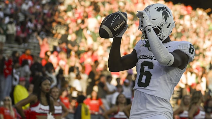 Sep 7, 2024; College Park, Maryland, USA; *Michigan State Spartans wide receiver Nick Marsh (6) celebrates after scoring a touchdown during the second half against the Maryland Terrapins  at SECU Stadium. Mandatory Credit: Tommy Gilligan-Imagn Images